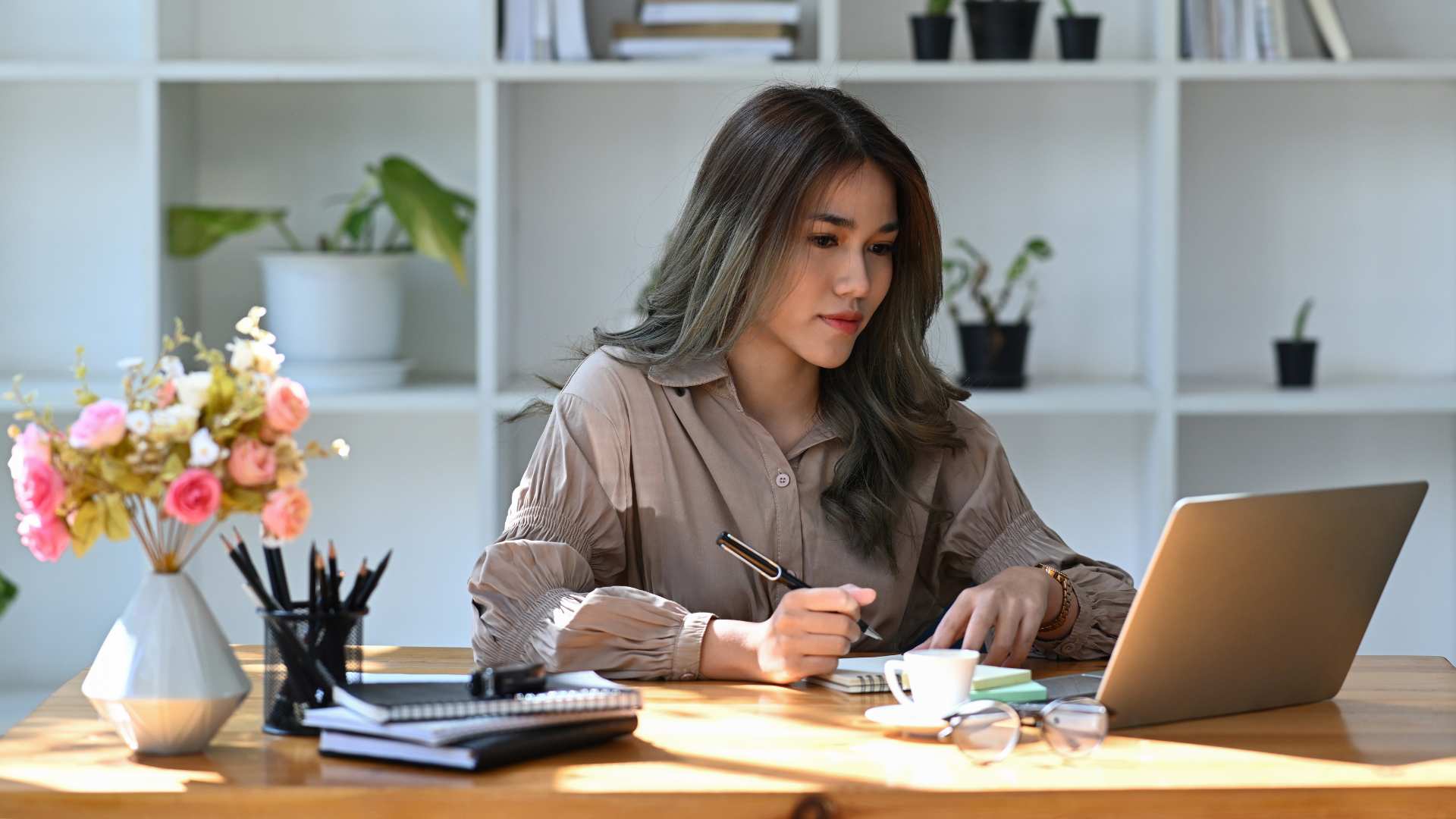 Businesswoman checking email on computer laptop